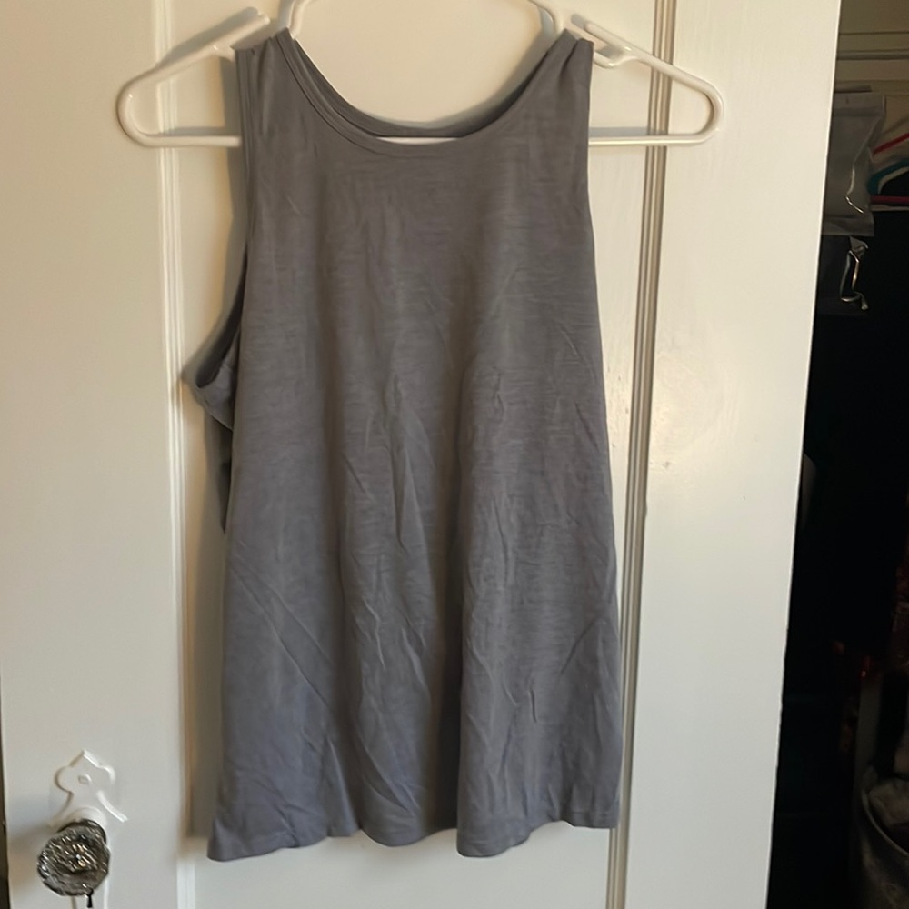 Grey exercise too with twist knot detail in back. Excellent condition.